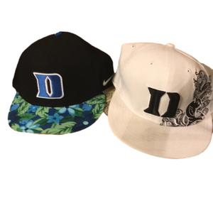 - Nike and New Era Duke hat.